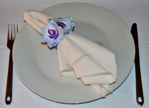 Easy Floral Lace Serviette Rings - place setting with napkin in serviette ring on white plate