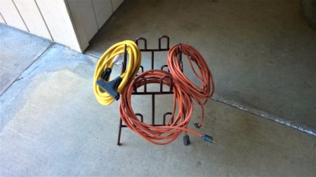 How to Reuse a Plastic Shoe Rack - coils of electrical cords hanging