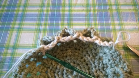 Making a Doily into a Bowl - chain 4 and slip stitch in the point of each shell to begin to draw up the doily