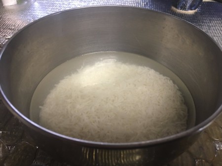rice soaking in water in bowl