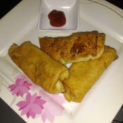 fried rolls on plate