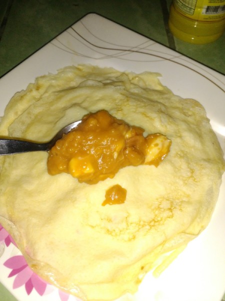 adding filling to wrap