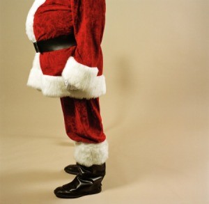 A man wearing a santa suit.