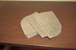 A stack of washcloths, to be used in moving furniture.