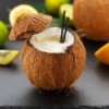 A Hawaiian drink in a coconut.