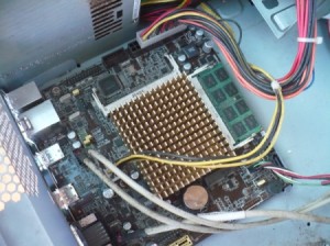 How to Change Your Motherboard and Build a Computer - insert motherboard into plate and make sure it is properly aligned