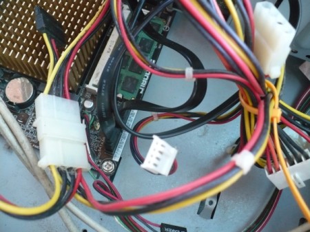 How to Change Your Motherboard and Build a Computer - locate SATA cables attached to motherboard then attach to hard drive and DVD drive