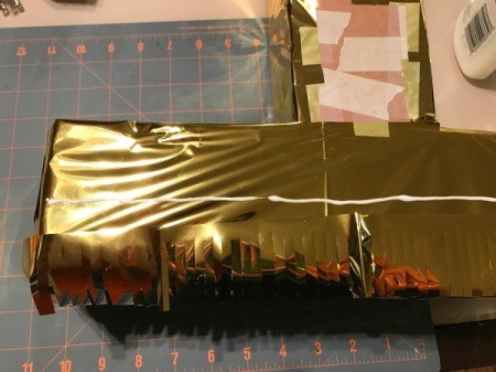 Birthday Number Piñata - fringe being added