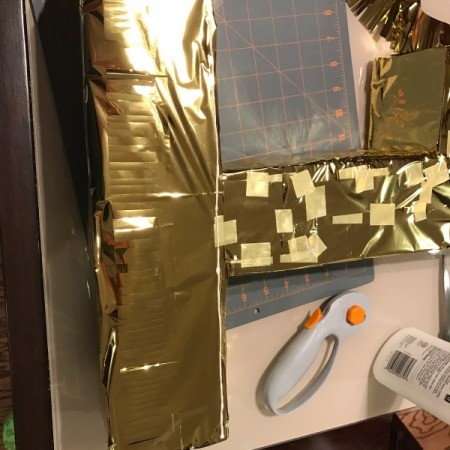 Birthday Number Piñata - closeup of fringe on crossbar bottom