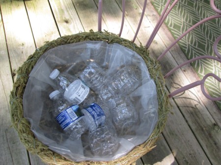 Thrift Store Garden Chair Planter - add plastic water bottles to basket