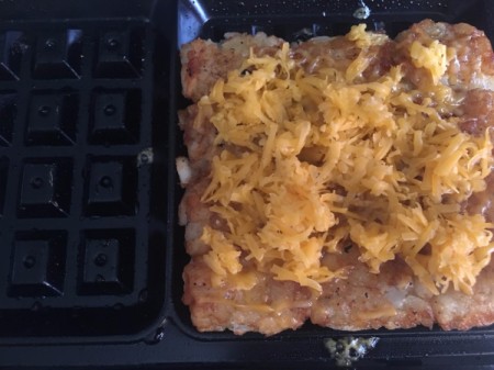 Cheese added to tater tot waffle