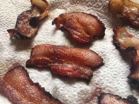 draining bacon on paper towel