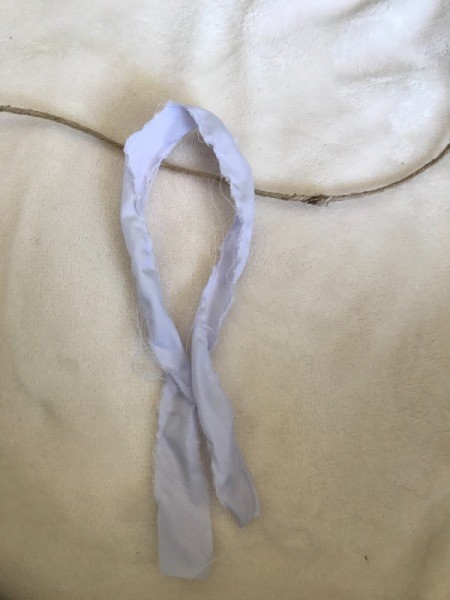 Fabric Garland - fold stip in half and lay across the twine