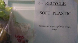 Signs for where to recycle plastics.