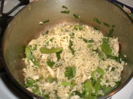 ramen noodles and veggies in pan