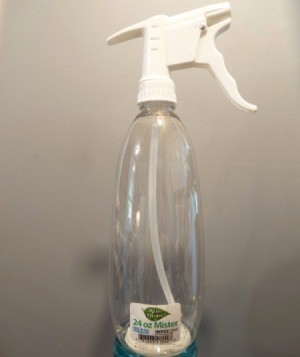 An inexpensive spray bottle from Wal-Mart