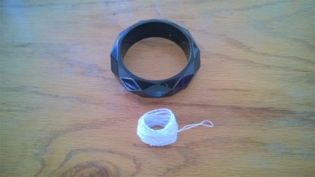 A Bevy of Crochet Bangles - plastic bangle and thread roll