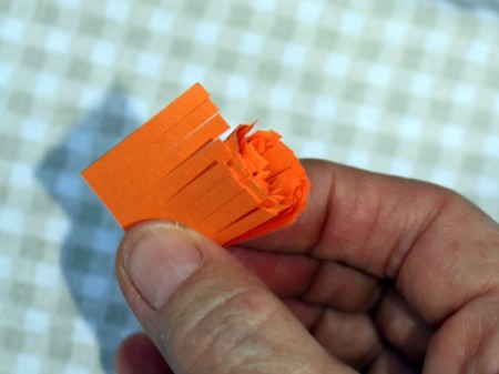 Paper Flower Bouquet - continue curling until you get to the end of the wide strip, glue