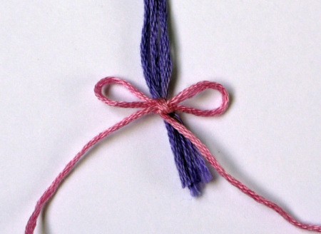 Heart Balloons Greetings Card - tie them with the longer piece, making a bow