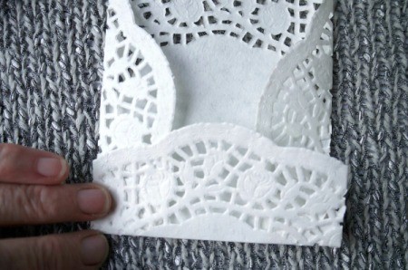 Paper Doily Envelope - fold the center bottom up and crease all 3 folds