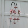 Making A Solar Outdoor Chandelier - hanging on a plant hanger in garden