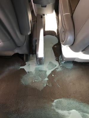 Is Walmart Liable for Spilled Paint? - large paint spill on van carpet