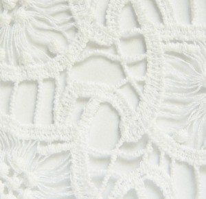 White crochet material.