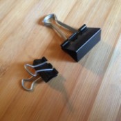 Two different sized binder clips, to be used in the freezer.