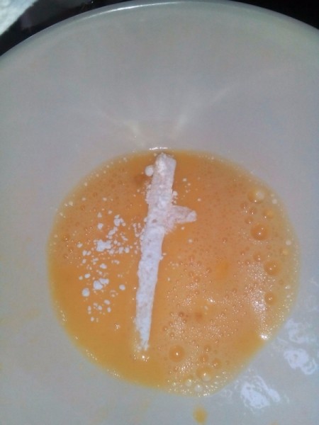 dipping floured cheese back in egg