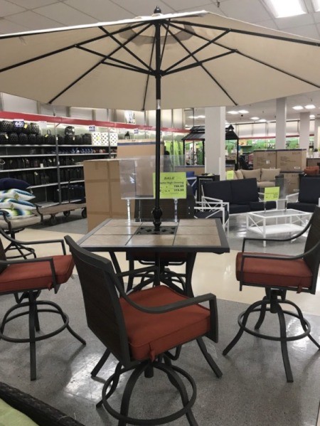 Patio furniture deals at a store closing sale.