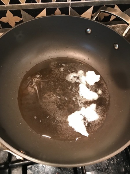 coconut oil in wok