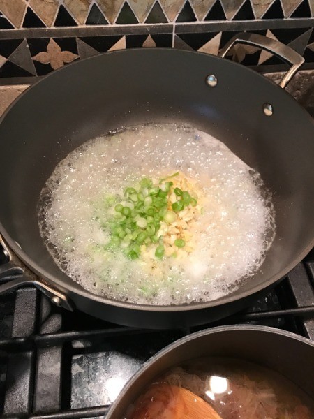 scallions in wok