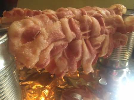 Woven Bacon laid on knife bridge