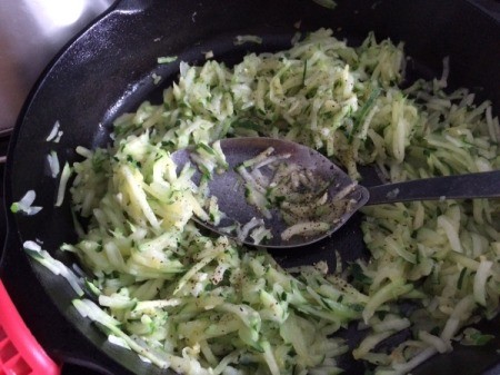 Sautéing Shredded Zucchini in pan