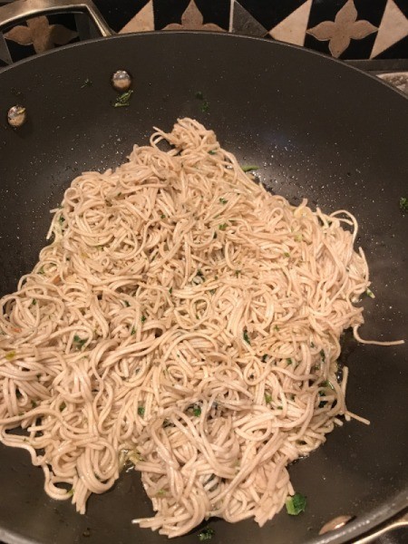 cooked soba noodles in wok