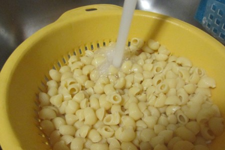 pasta shells in colander