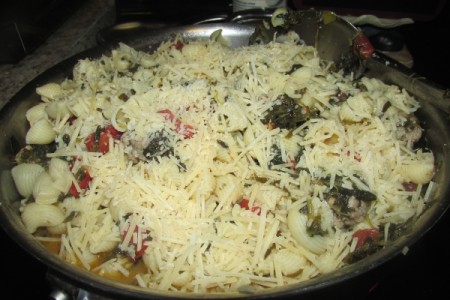 Garlic Basil Spinach Shells covered with Parmesan