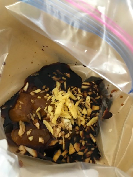 chicken thighs marinating