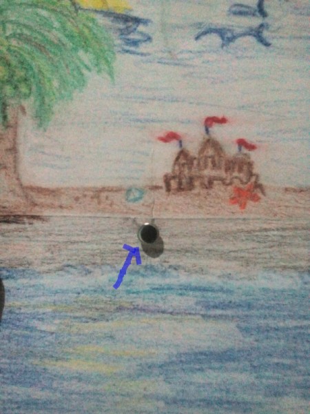 Day and Night Spinning Card - insert fastener and secure the back