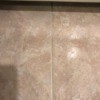 A clean grout line on a tiled floor.