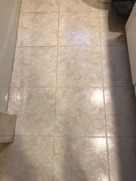 A tile floor with clean grout.