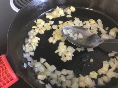 onion and garlic in pan