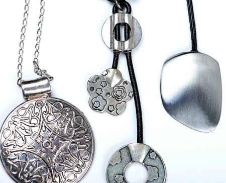 Photo of silver jewelry.