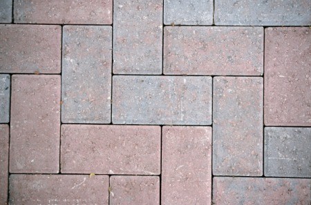 Close up of a red brick patio.