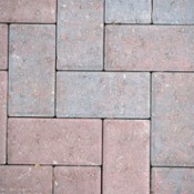 Close up of a red brick patio.