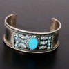 A turquoise and silver bracelet.