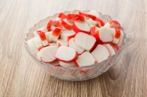 A bowl of imitation crab meat.