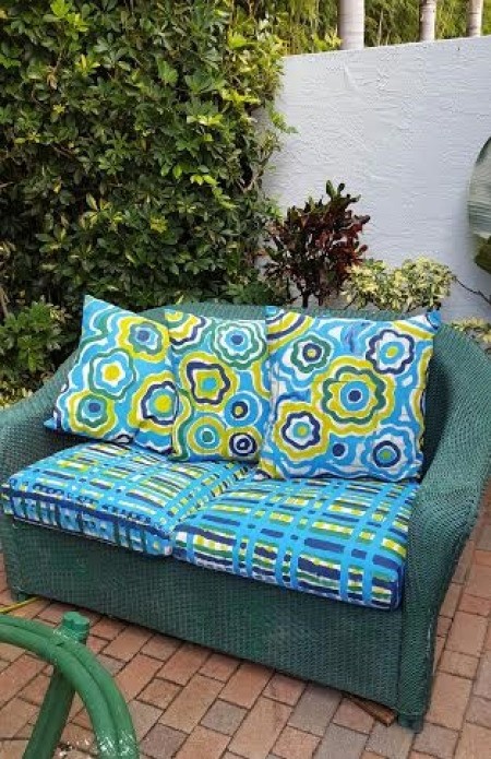Colorful New Look for Faded Patio Pillows - finished pillows on couch