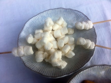 Flower Pot for Making Tabletop Mini S'mores - putting mini marshmallows on skewers