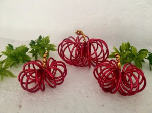 Mini Floral Wire Pumpkins - pumpkins arranged with some greenery